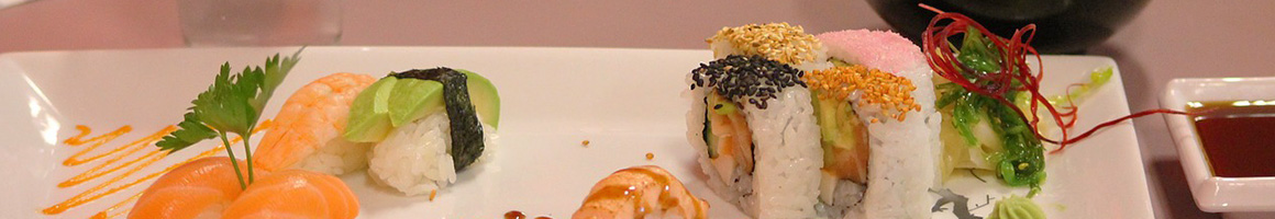 Eating Japanese Seafood Sushi at Tanoshi Sushi Sake Bar restaurant in New York, NY.